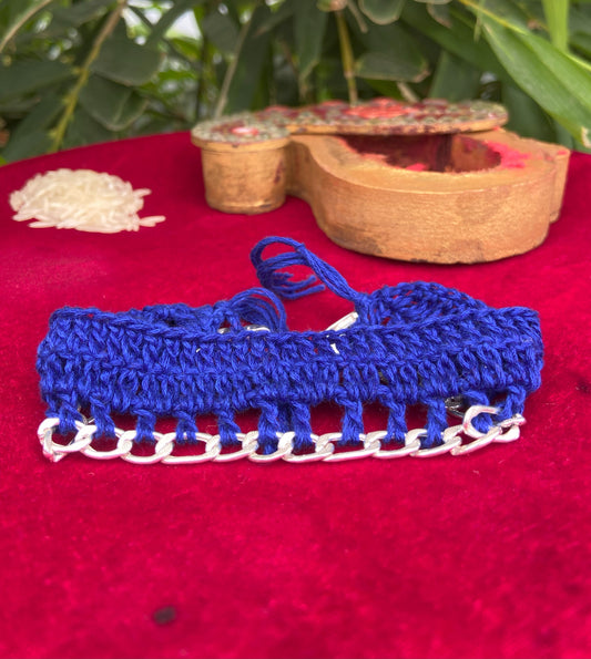 "Threaded Grace – Crochet Rakhi with Elegant Silver Chain Accent"